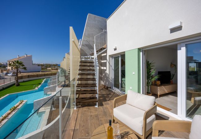 Appartement in Pilar de la Horadada - Casita Calor – Gezellig appartement met dakterras